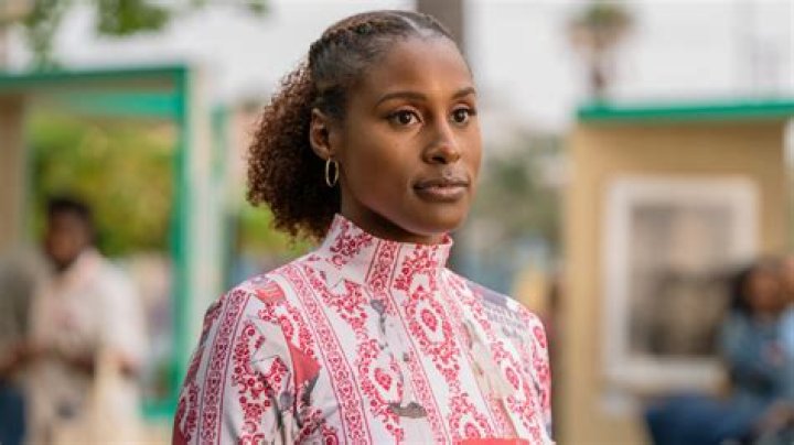 Issa Rae aka Issa Dee Red cold sholder jacket by Thebe Magugu in 2020