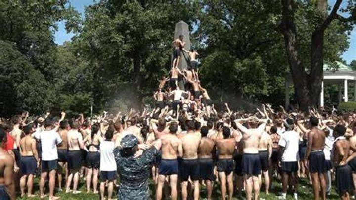 Midshipmen climb the Herndon Monument Capital Gazette