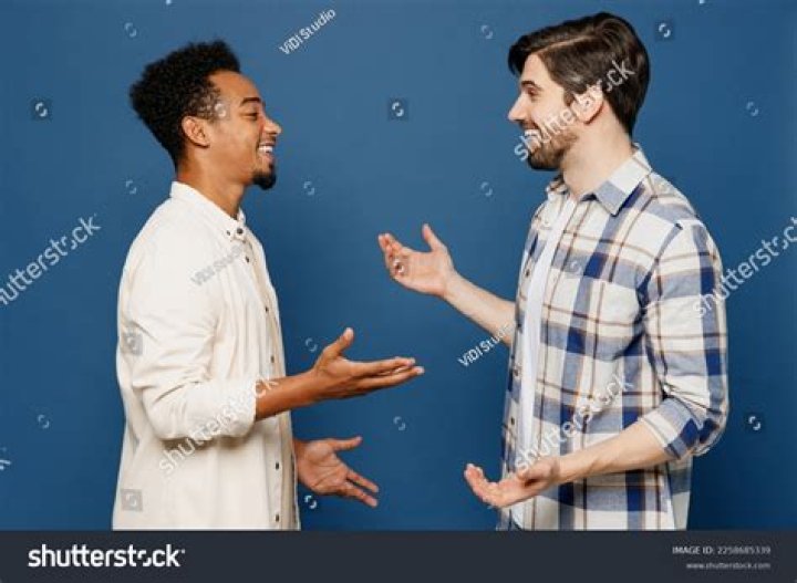 Picture of Man Talking On Cellphone Free Stock Photo