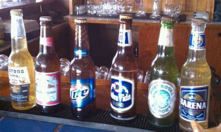 Roatan Beer bottle, Roatan, Drinking