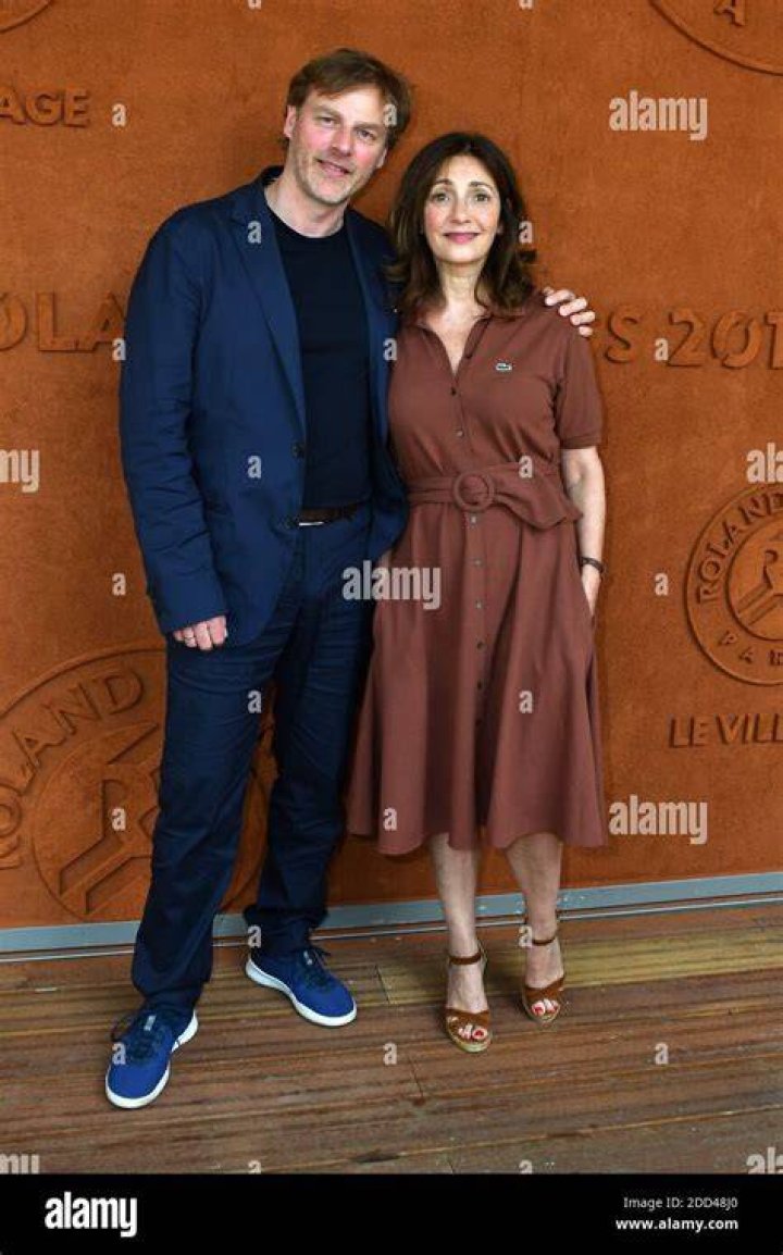 Valerie Karsenti and her husband François Feroleto posing at the